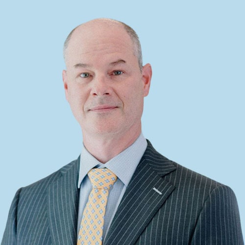 Scott Freeman, MD, with blue background